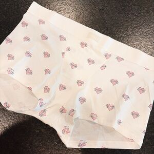SKIMS VALENTINES Boyfriend Boxer Briefs with Pink Heart Print.